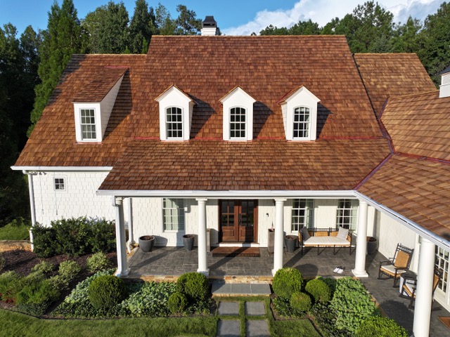 Heavy hand-split cedar shakes with dormers on a Roswell, Georgia residence